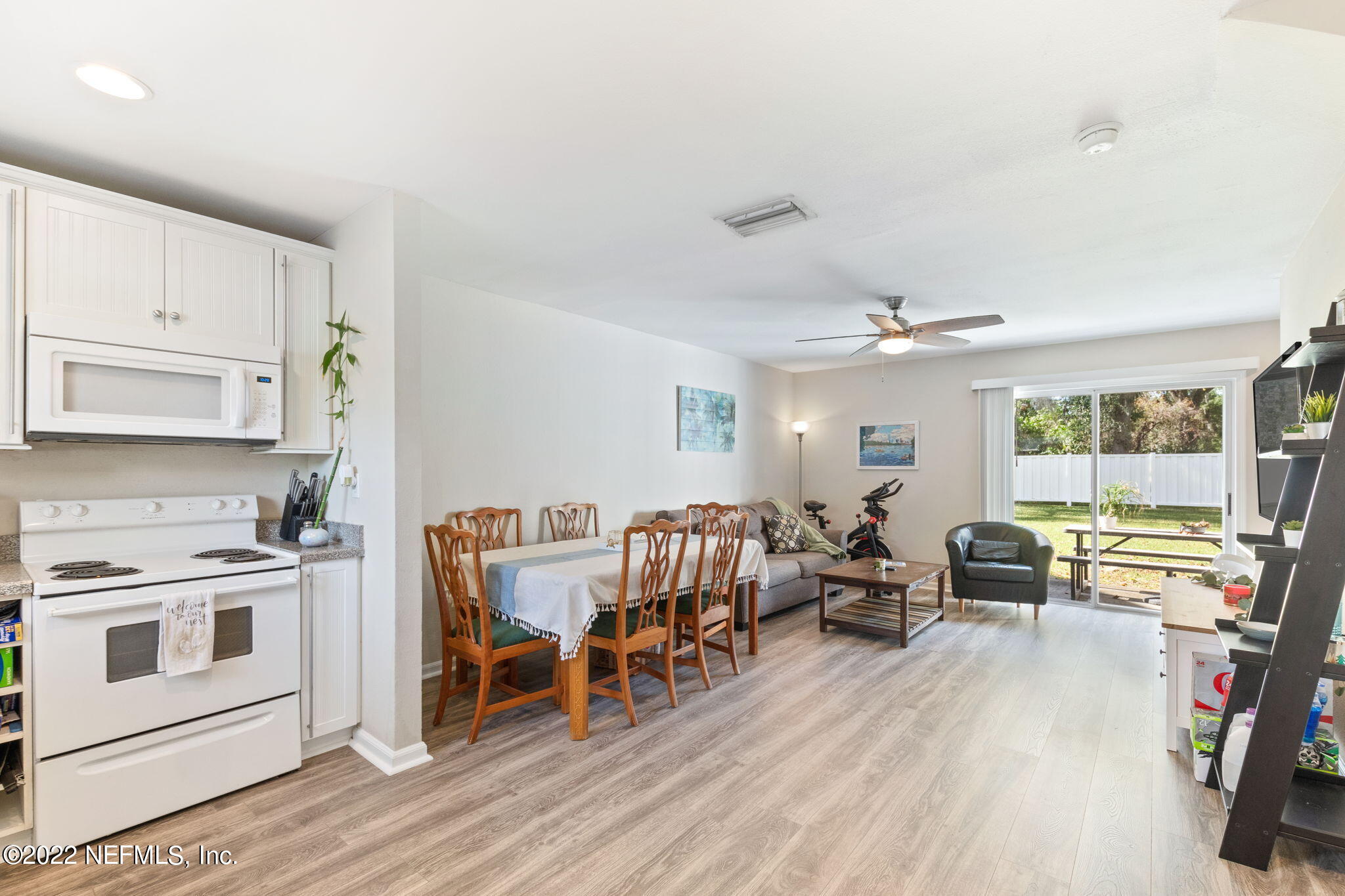 4420 Carter Road, Unit 5 St. Augustine, FL 32086 - Photo 5 of 29 a living room with furniture and a wooden floor