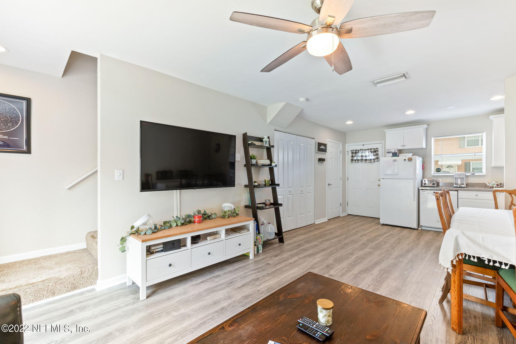 4420 Carter Road, Unit 5 St. Augustine, FL 32086 - Photo 9 of 29 a living room with furniture and a flat screen tv