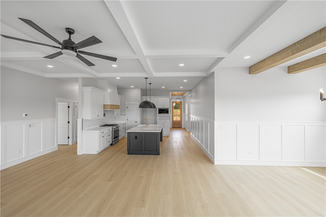 1619 Old Dobbins Bridge Road Townville, SC 29689 - Photo 11 of 34 This open concept kitchen and living space offers contemporary design and bright, inviting interiors.