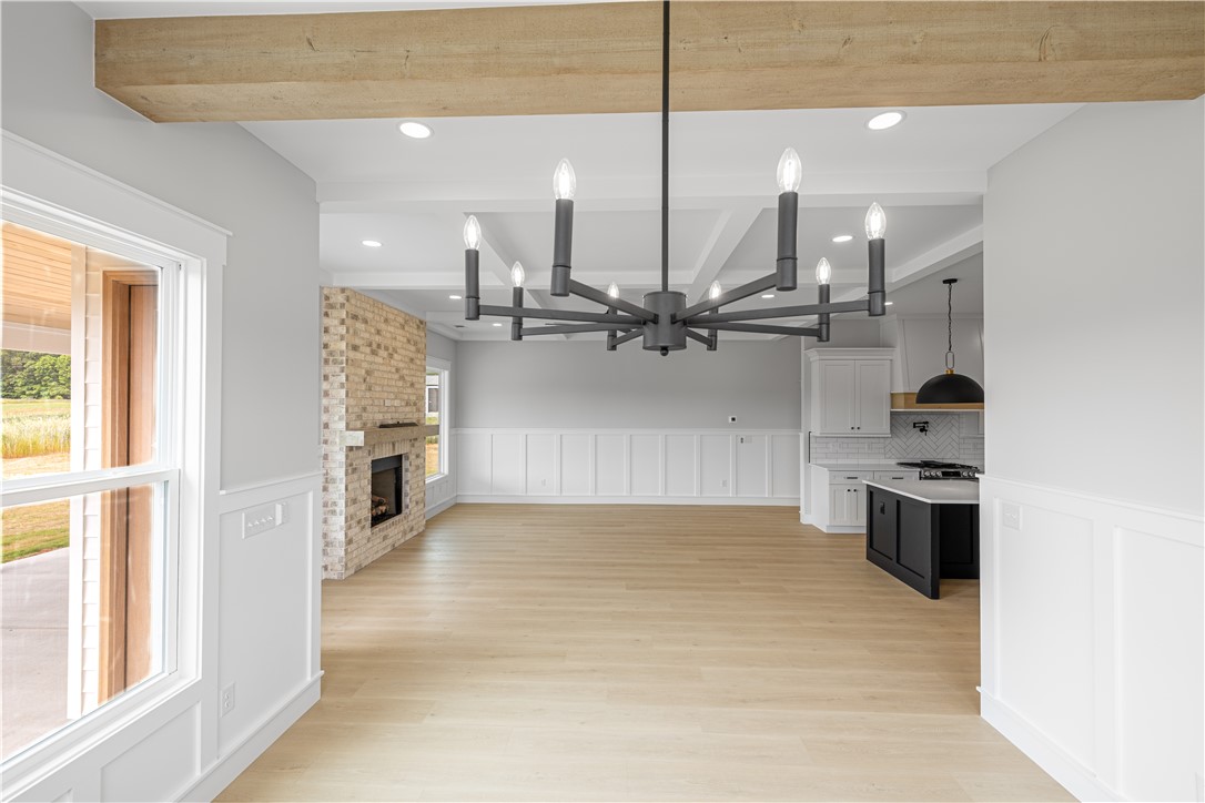 1619 Old Dobbins Bridge Road Townville, SC 29689 - Photo 12 of 34 This expansive open concept living space features abundant natural light, creating an inviting atmosphere.