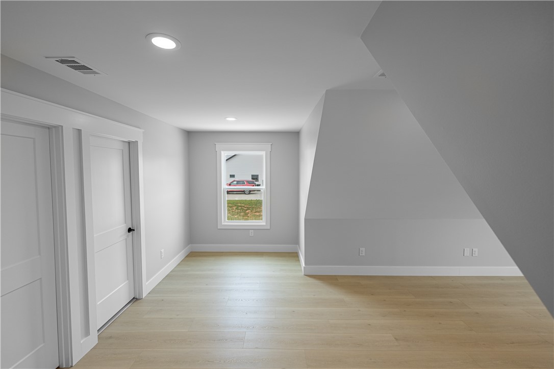 1619 Old Dobbins Bridge Road Townville, SC 29689 - Photo 18 of 34 This bright room features durable flooring and ample natural light, creating a versatile living space.