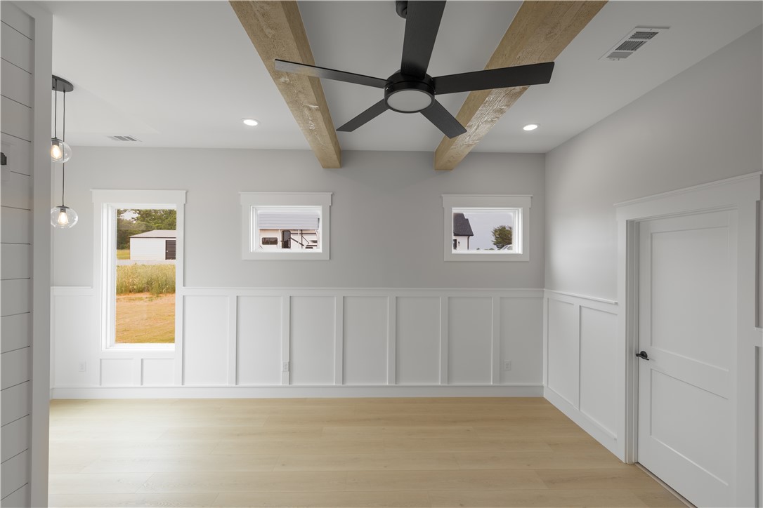 1619 Old Dobbins Bridge Road Townville, SC 29689 - Photo 21 of 34 This bright space features charming exposed beams, pristine wainscoting, and durable wood flooring.