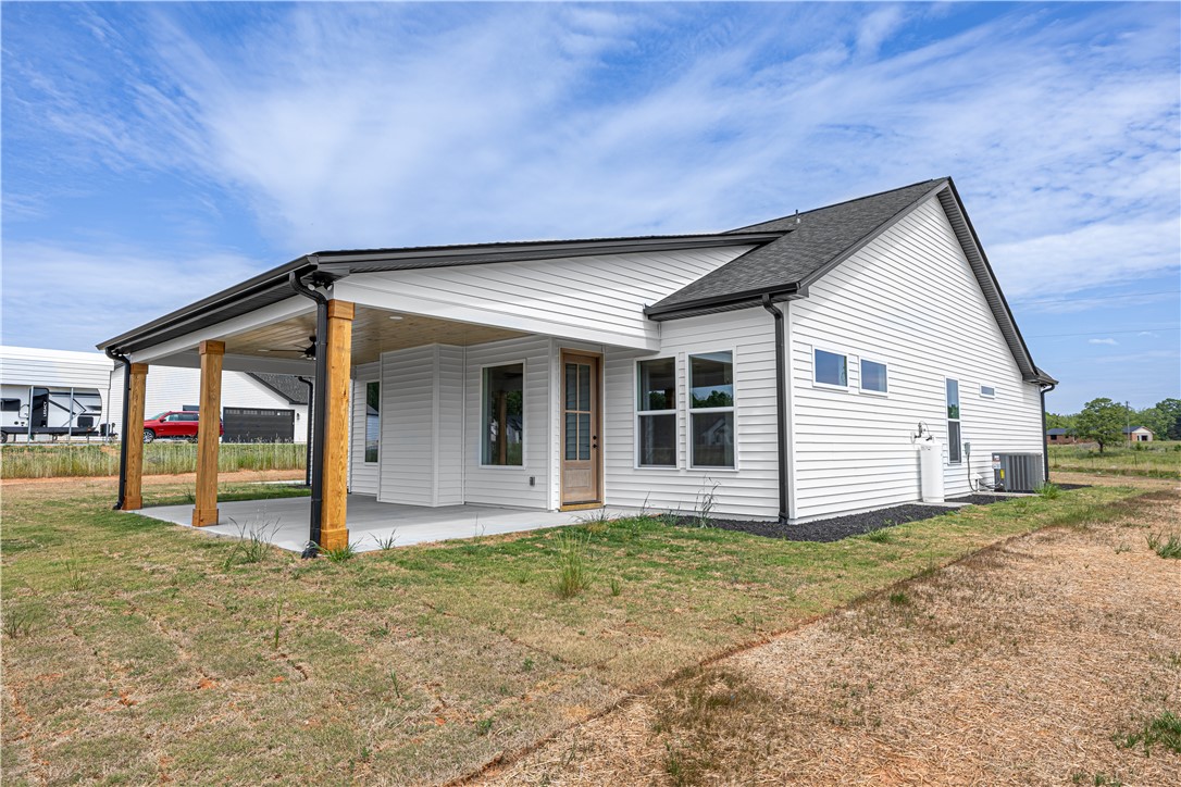 1619 Old Dobbins Bridge Road Townville, SC 29689 - Photo 31 of 34 This newly constructed home features a covered patio perfect for outdoor living and entertaining.