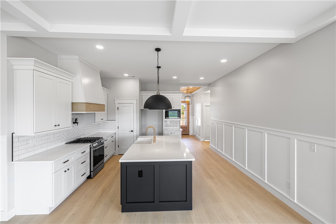 1619 Old Dobbins Bridge Road Townville, SC 29689 - Photo 10 of 34 Bright and airy, this kitchen offers contemporary design and seamless flow for daily living.