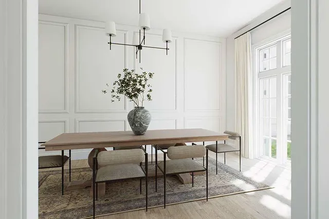 a dining room with furniture and window