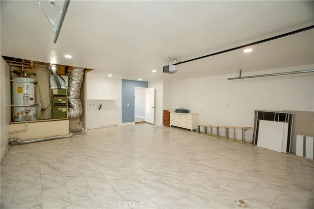 an empty room with a mirror