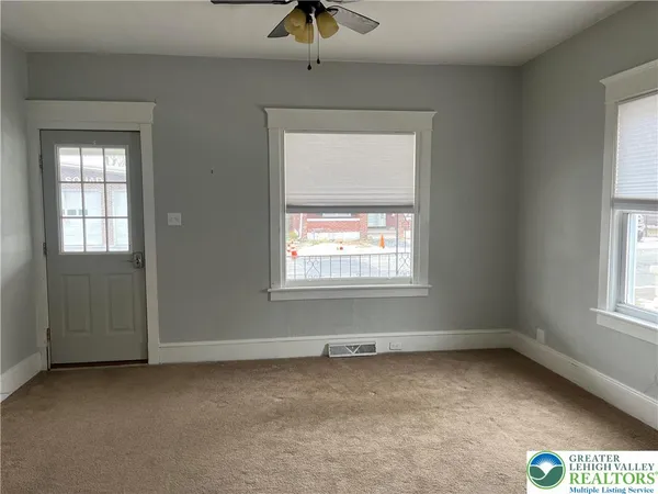 an empty room with a window