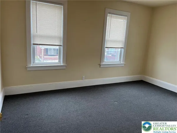 an empty room with a window