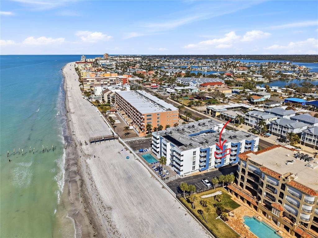 16308 Gulf Boulevard, Unit 303 Redington Beach, FL 33708 - Photo 1 of 42 an aerial view of a city
