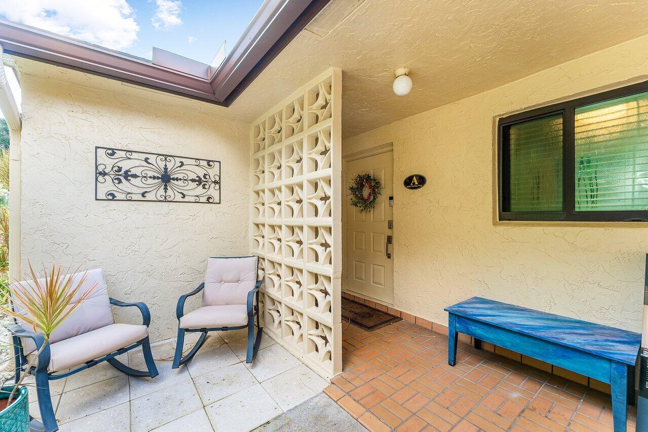 5300 Nesting Way, Unit A Delray Beach, FL 33484 - Photo 25 of 53 a bathroom with a sink and a mirror