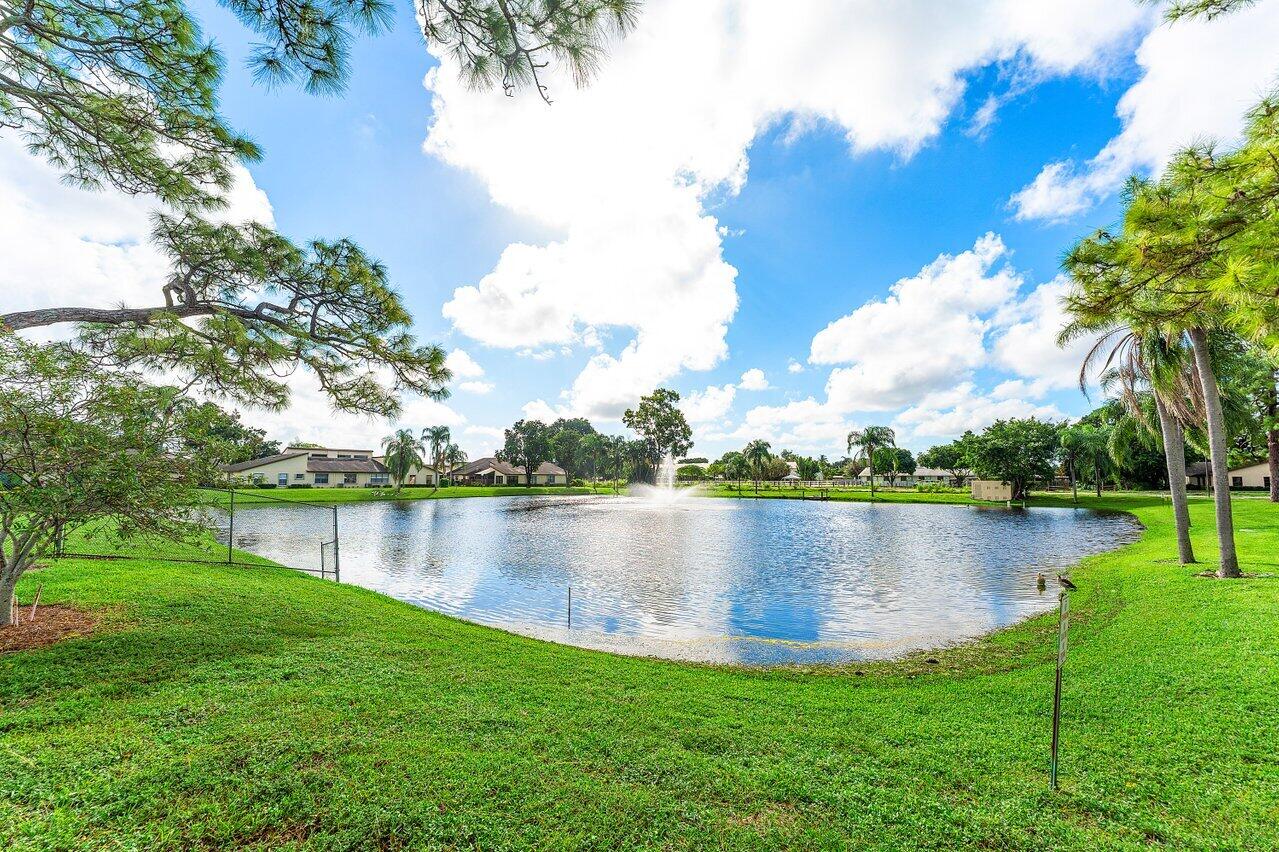 5300 Nesting Way, Unit A Delray Beach, FL 33484 - Photo 38 of 53 a view of a lake