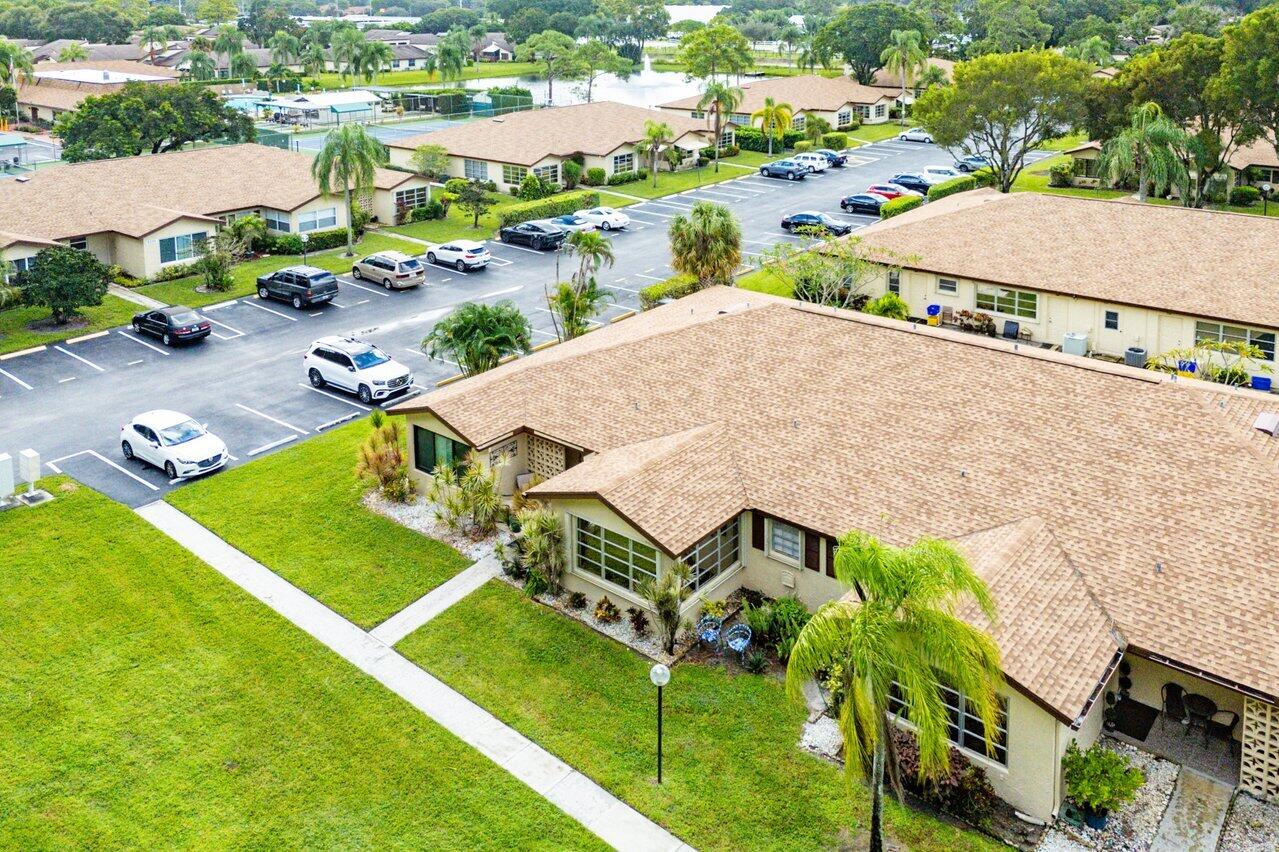 5300 Nesting Way, Unit A Delray Beach, FL 33484 - Photo 43 of 53 an aerial view of a house with a yard