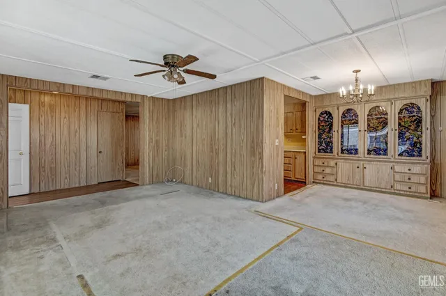 wooden floor in a hall with a window