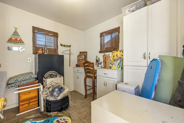 a bedroom with furniture and a bed