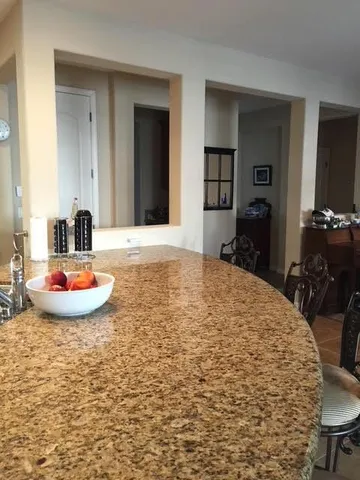 a lobby with furniture and window