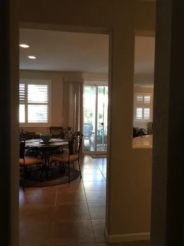 a kitchen with stainless steel appliances granite countertop a sink and a stove