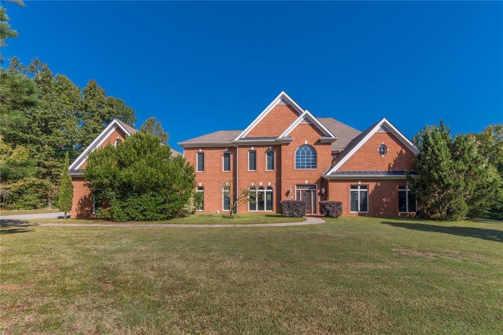 865 Liberty Grove Road Alpharetta, GA 30004 - Photo 1 of 1 This 4 side brick beauty sits on a beautiful 4 acre lot in desirable Alpharetta.