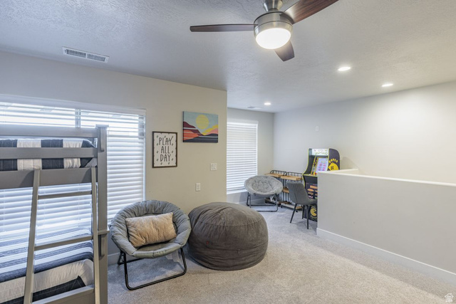 4845 Fishers Is Way St. George, UT 84770 - Photo 14 of 41 Sitting room featuring carpet floors, a textured ceiling, a ceiling fan, and recessed lighting