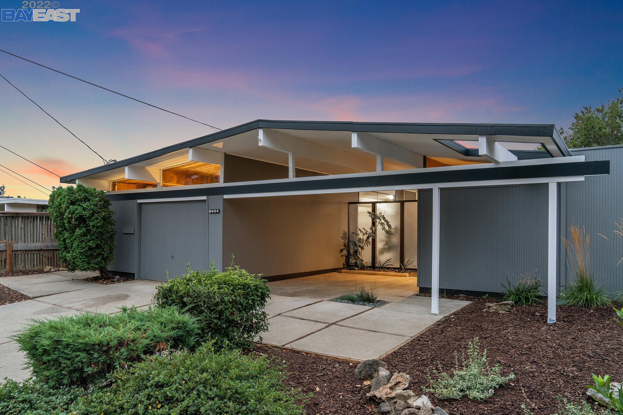 5854 Greenridge Road Castro Valley, CA 94552 - Photo 1 of 1 a front view of a house with a garage