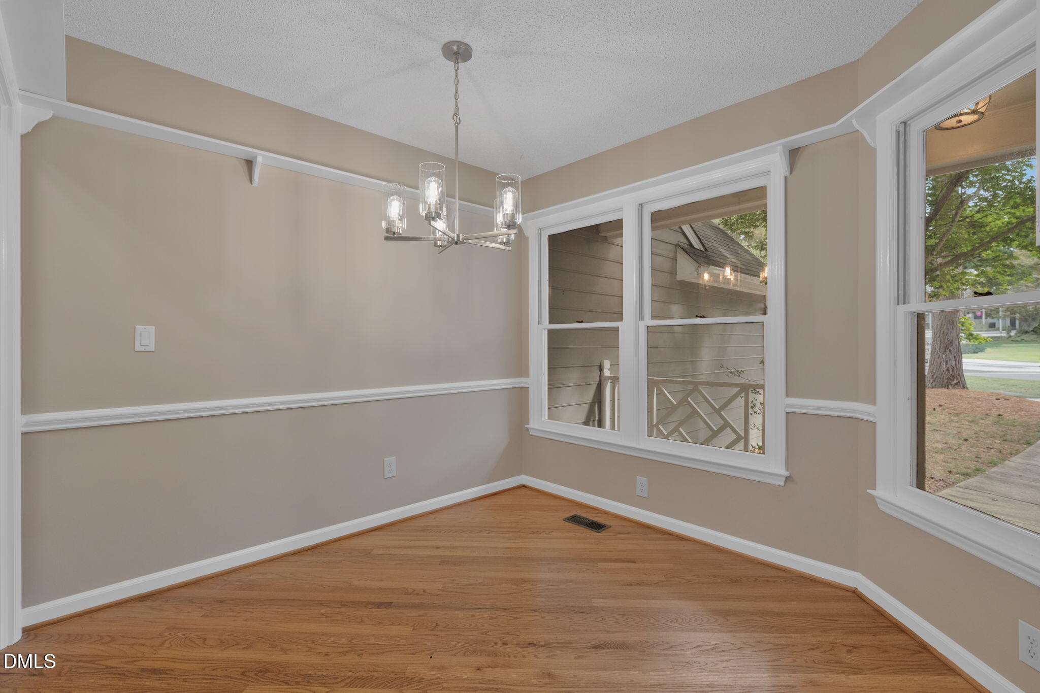 42 Renwick Court Raleigh, NC 27615 - Photo 15 of 58 a view of an empty room with a window