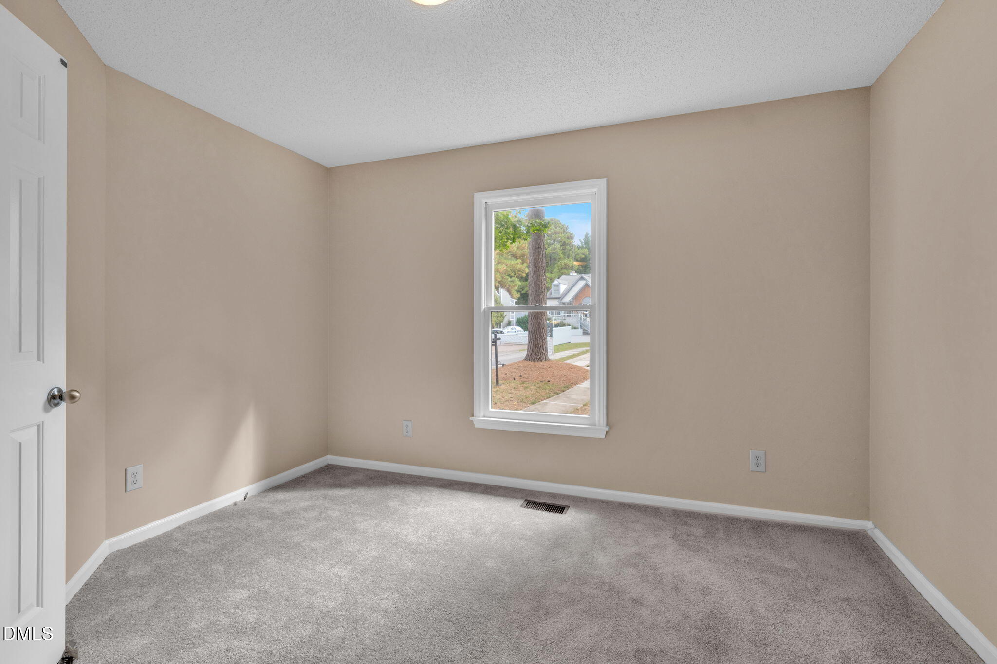 42 Renwick Court Raleigh, NC 27615 - Photo 25 of 58 an empty room with windows