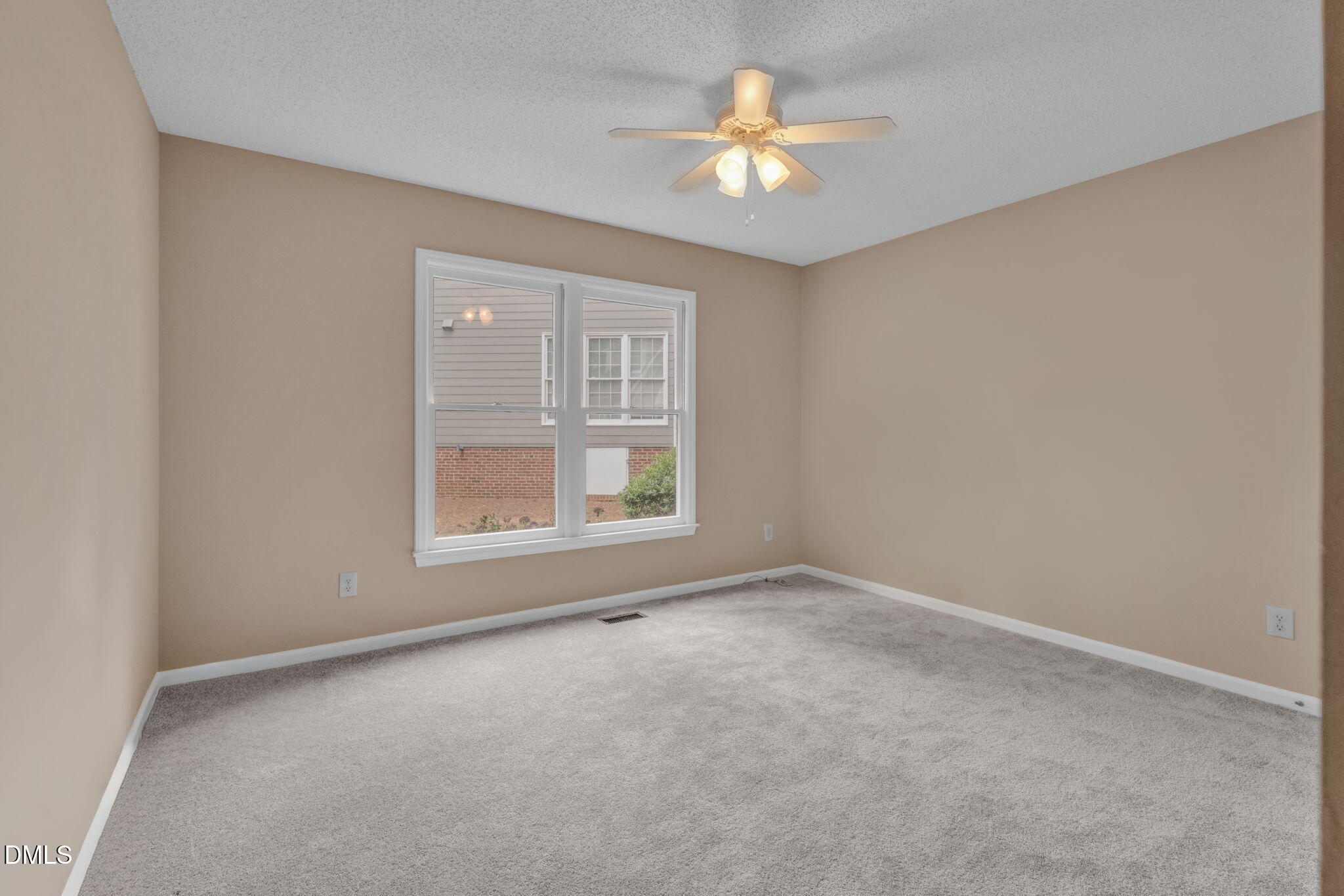 42 Renwick Court Raleigh, NC 27615 - Photo 30 of 58 an empty room with windows