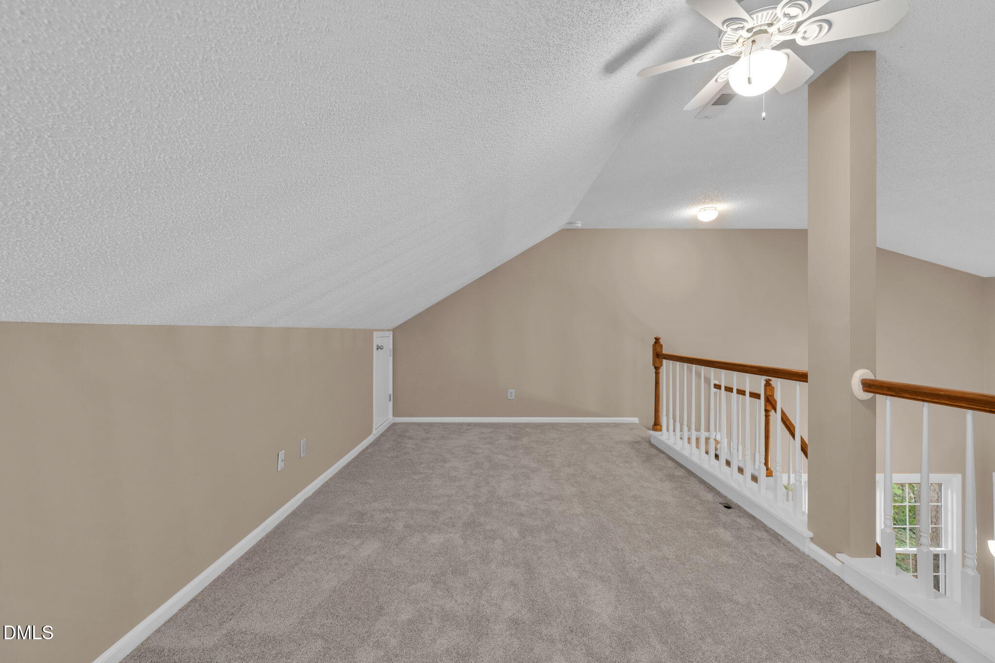 42 Renwick Court Raleigh, NC 27615 - Photo 32 of 58 a view of an empty room with chandelier fan