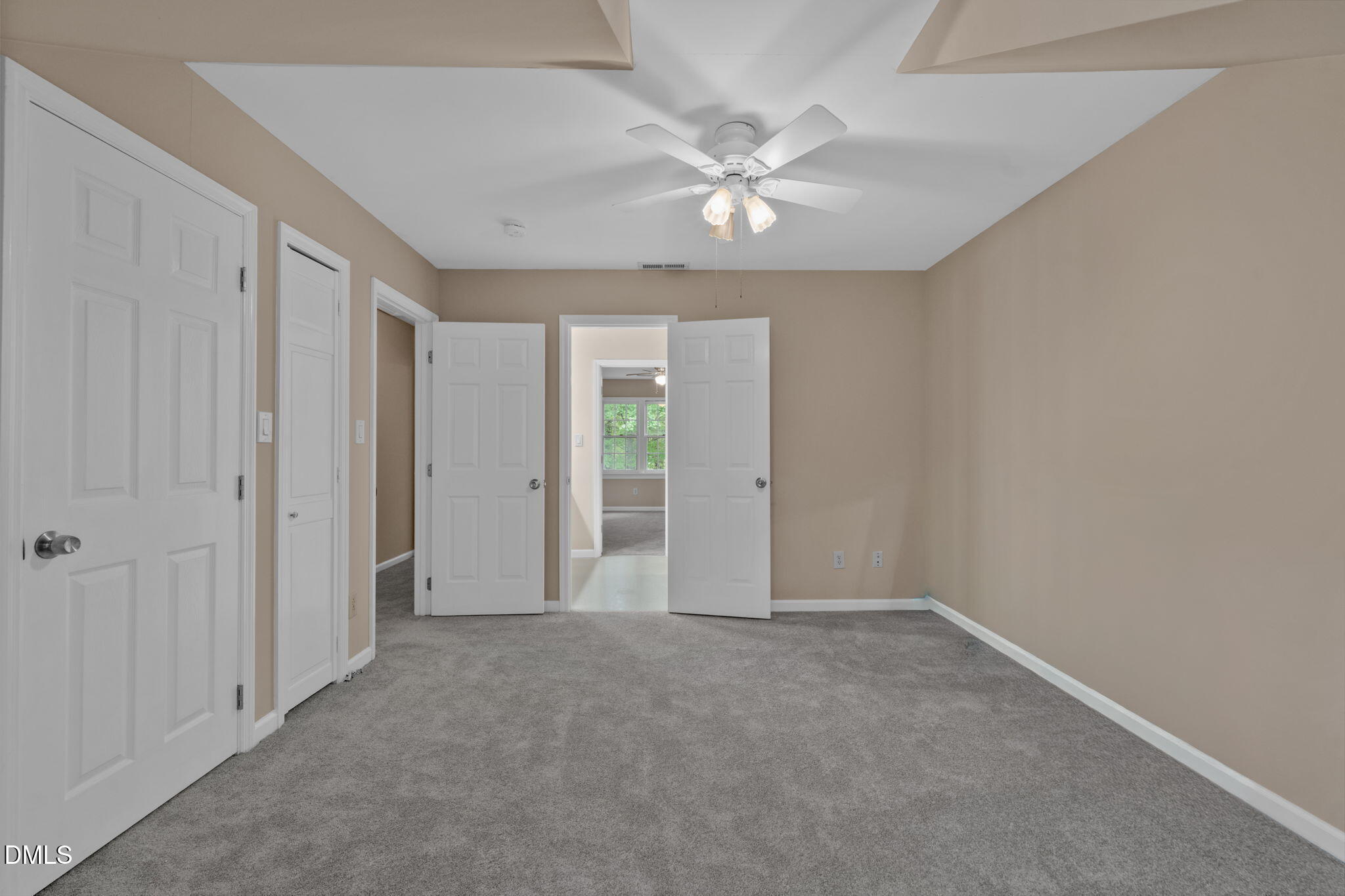 42 Renwick Court Raleigh, NC 27615 - Photo 35 of 58 a view of an empty room with a window