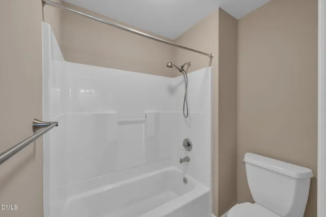 a front view of a building with umbrellas