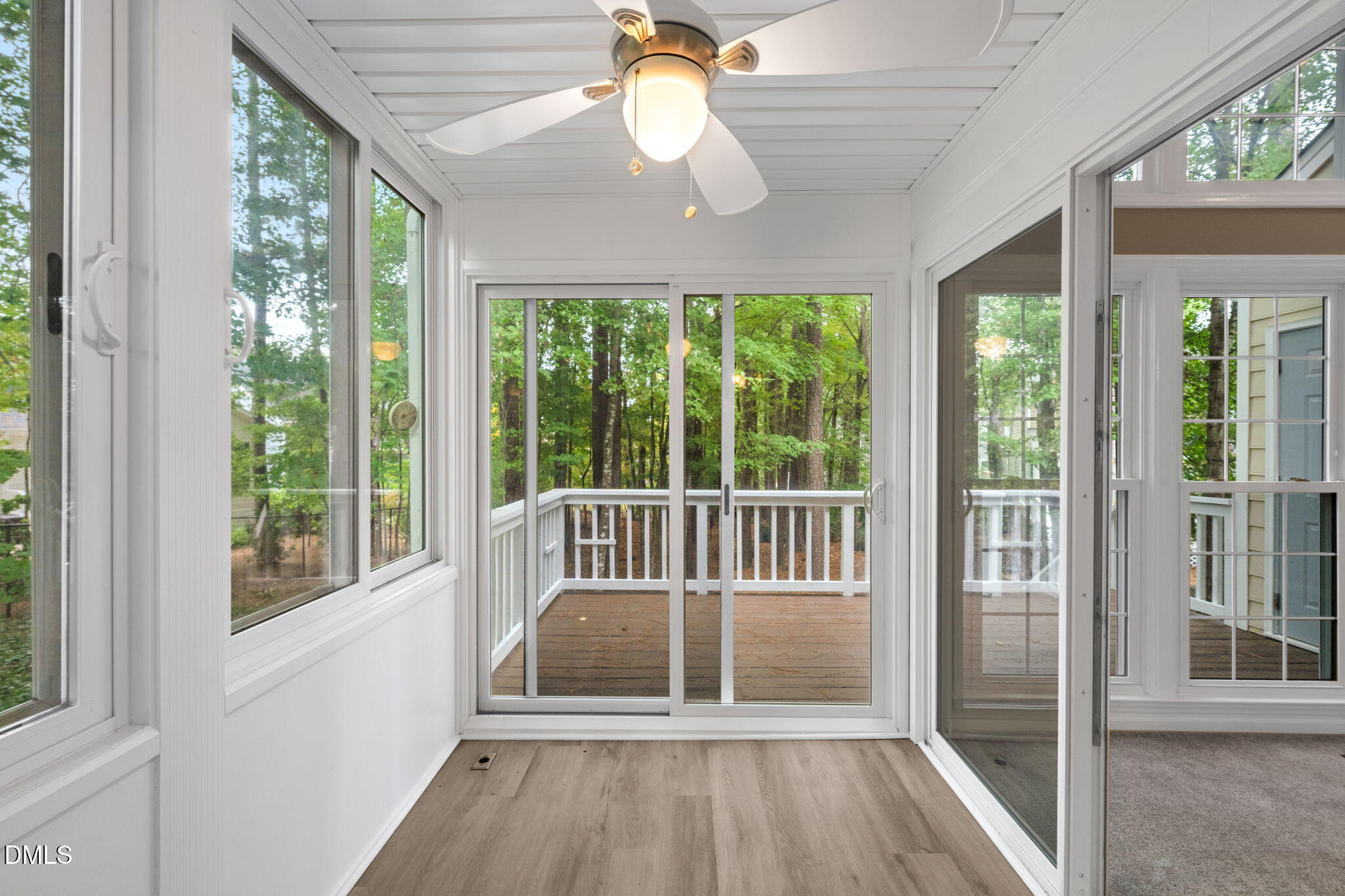 42 Renwick Court Raleigh, NC 27615 - Photo 42 of 58 a view of a room with wooden floor and balcony
