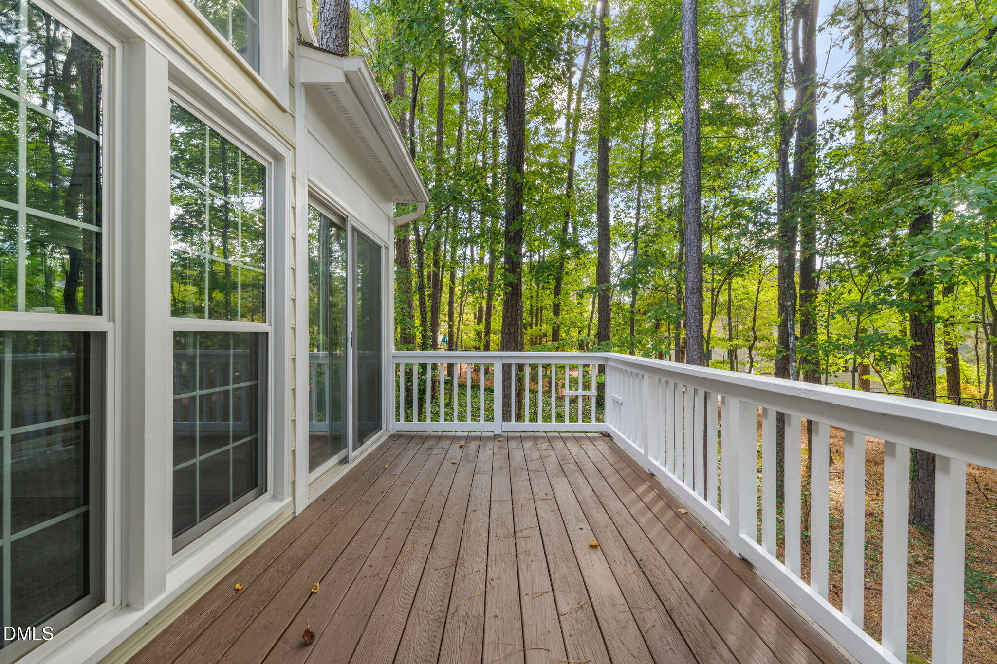 42 Renwick Court Raleigh, NC 27615 - Photo 47 of 58 a view of a wooden deck
