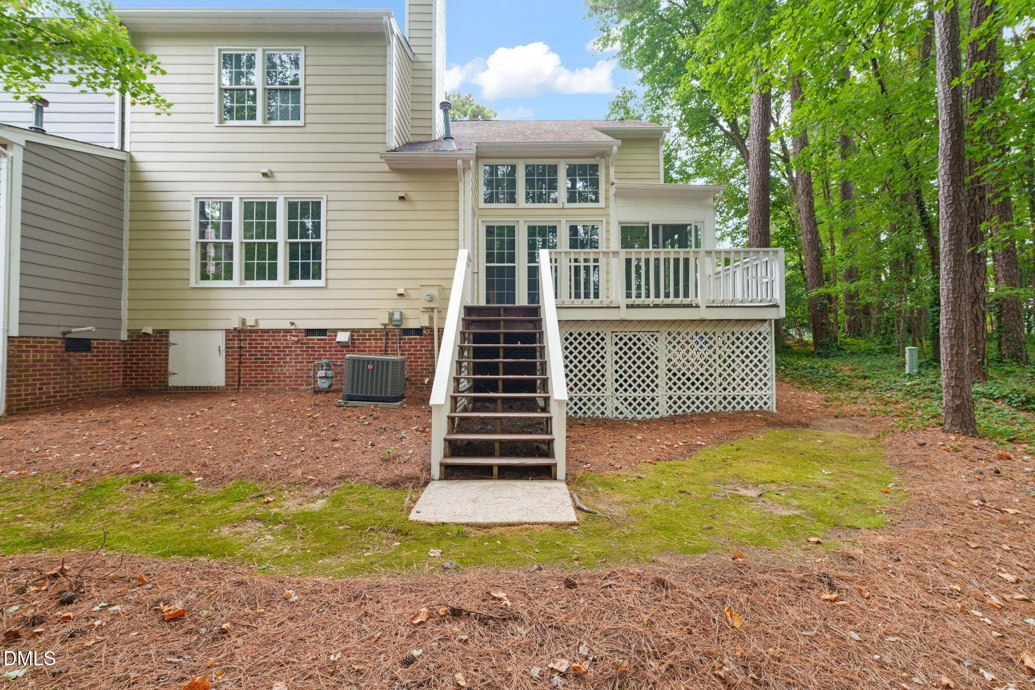 42 Renwick Court Raleigh, NC 27615 - Photo 48 of 58 a front view of a house with garden