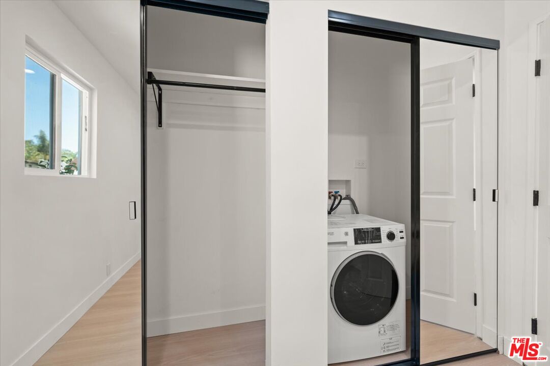 702 Washington Boulevard Marina del Rey, CA 90292 - Photo 12 of 18 a utility room with dryer and washer