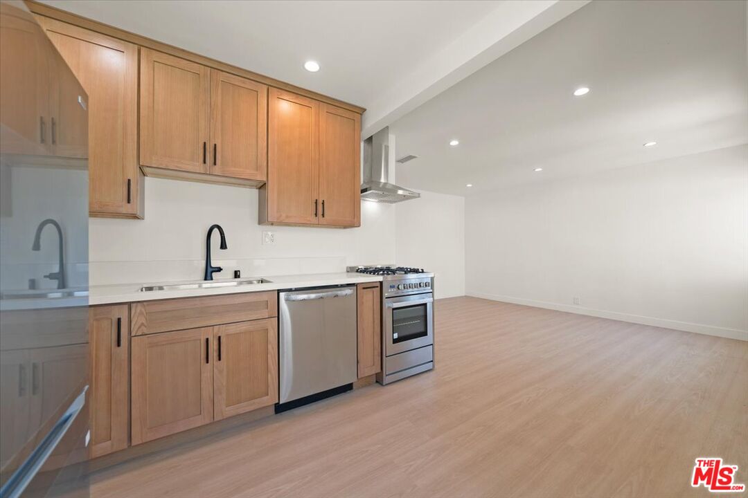 702 Washington Boulevard Marina del Rey, CA 90292 - Photo 9 of 18 a kitchen with sink and cabinets