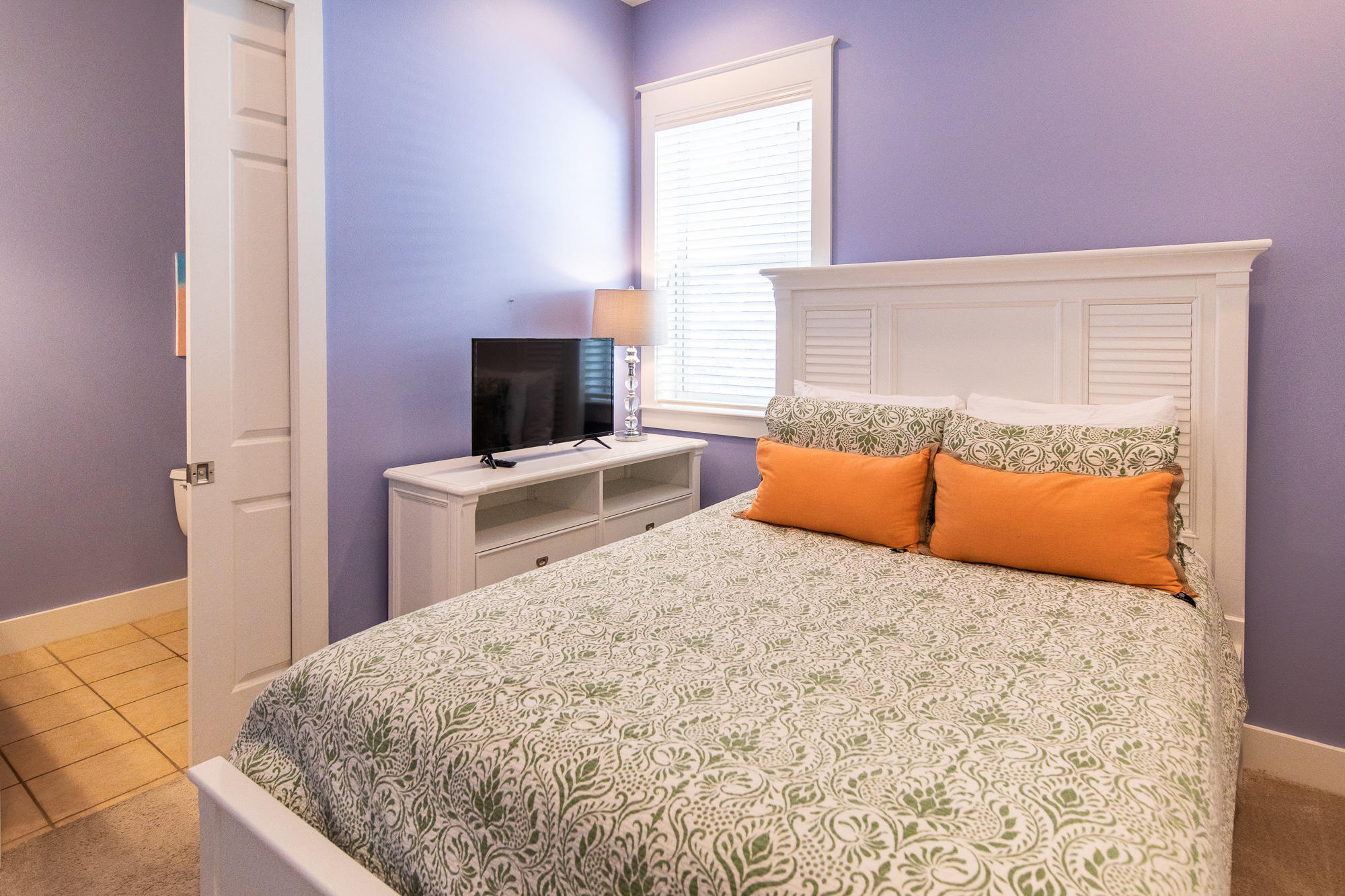 49 Endless Summer Way East Inlet Beach, FL 32461 - Photo 22 of 40 a bedroom with a bed and a flat screen tv