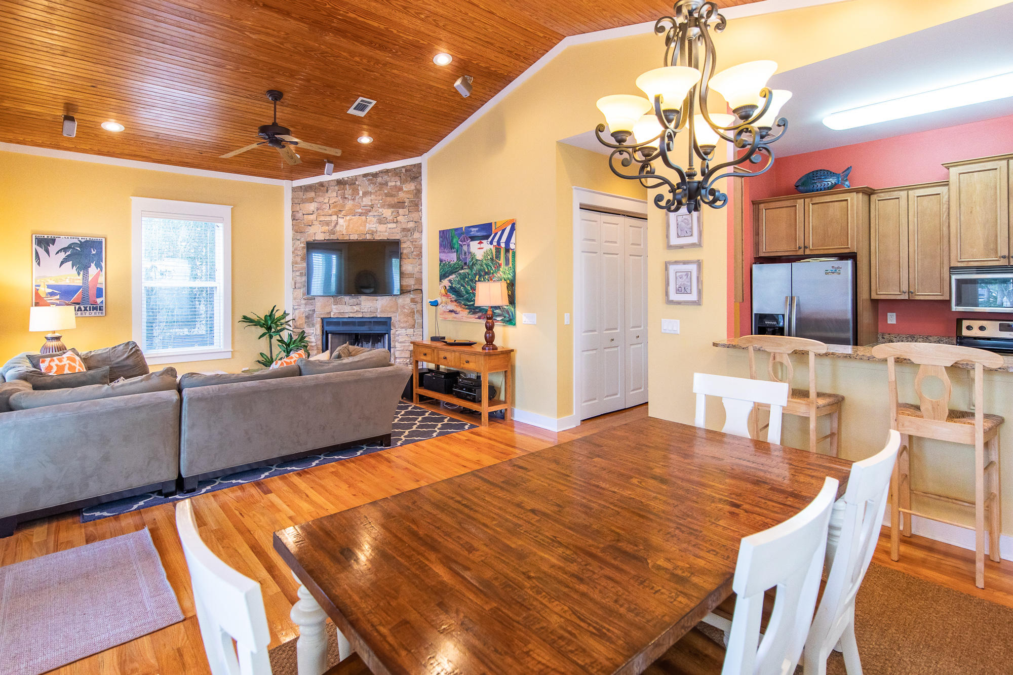 49 Endless Summer Way East Inlet Beach, FL 32461 - Photo 10 of 40 a view of a dining room with furniture a chandelier and wooden floor