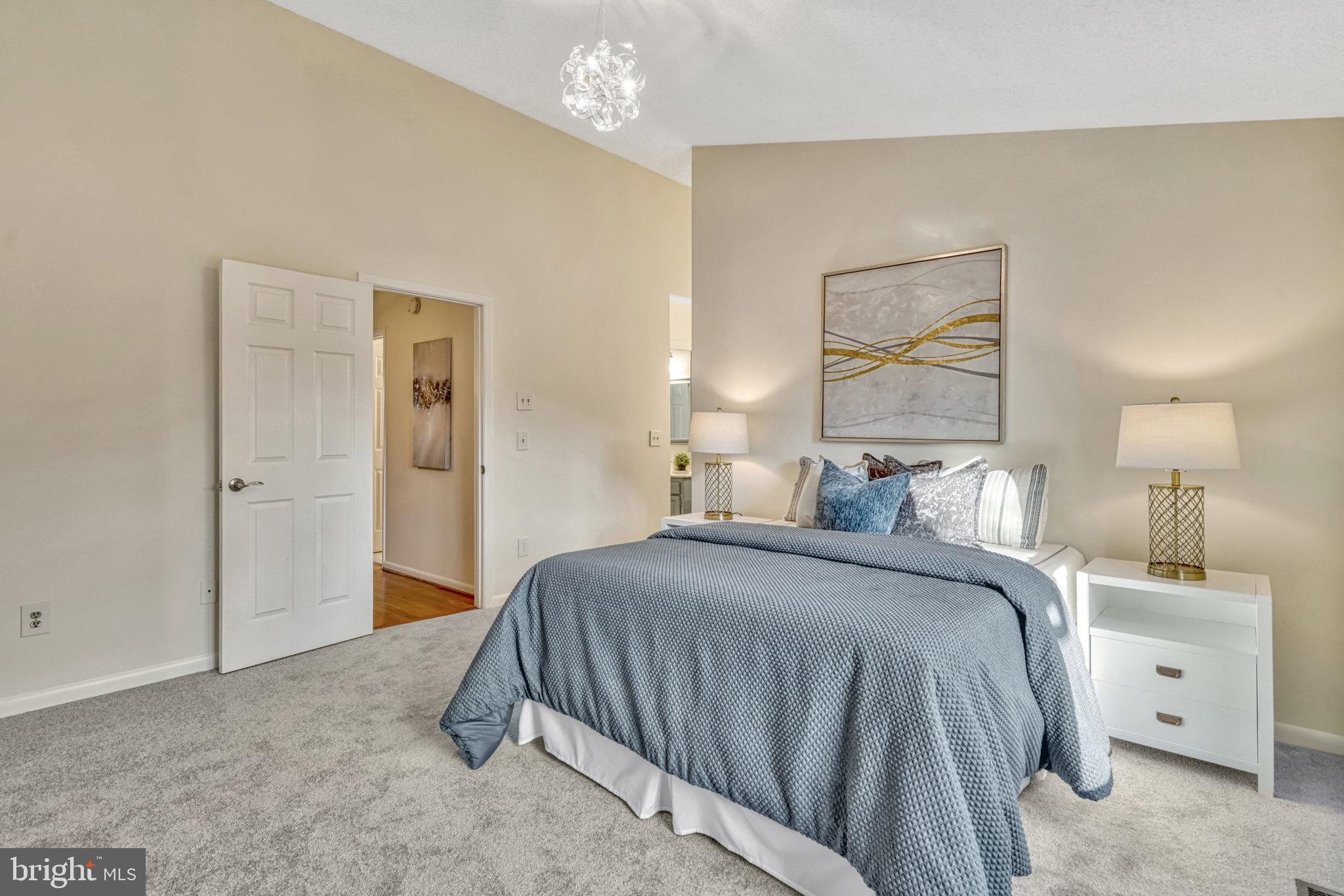 1423 Newport Spring Court Reston, VA 20194 - Photo 18 of 45 primary bedroom with vaulted ceilings