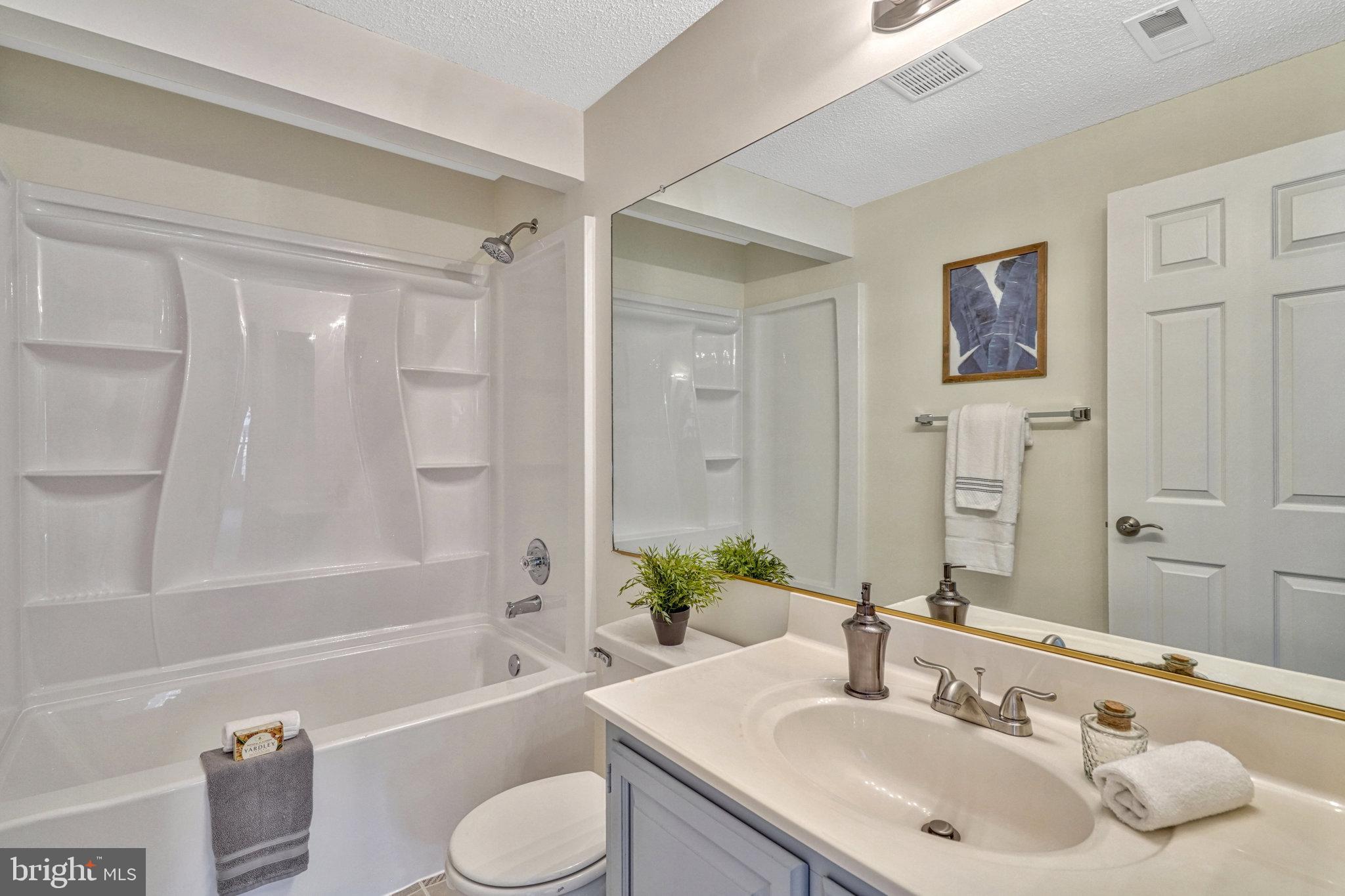 1423 Newport Spring Court Reston, VA 20194 - Photo 34 of 45 full bathroom with new tub/shower in lower level