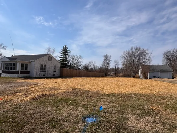 a house view with a backyard of a house
