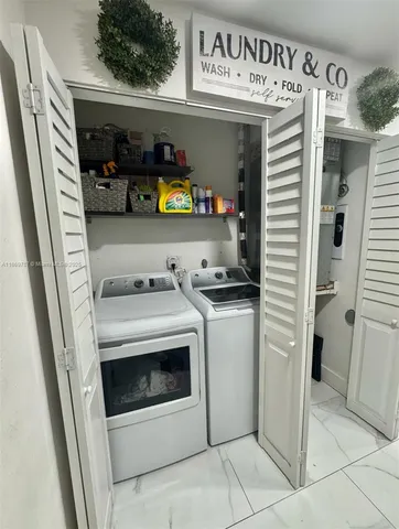 a bathroom with a toilet a sink and a mirror