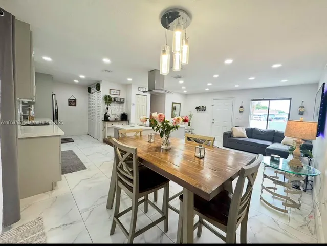 a view of a dining room and livingroom view