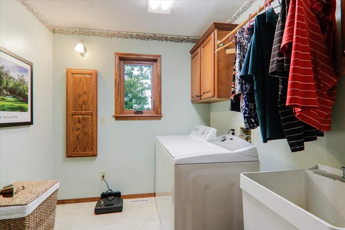 21 Bent Tree Lane Towanda, IL 61776 - Photo 11 of 49 a bathroom with a sink and a window