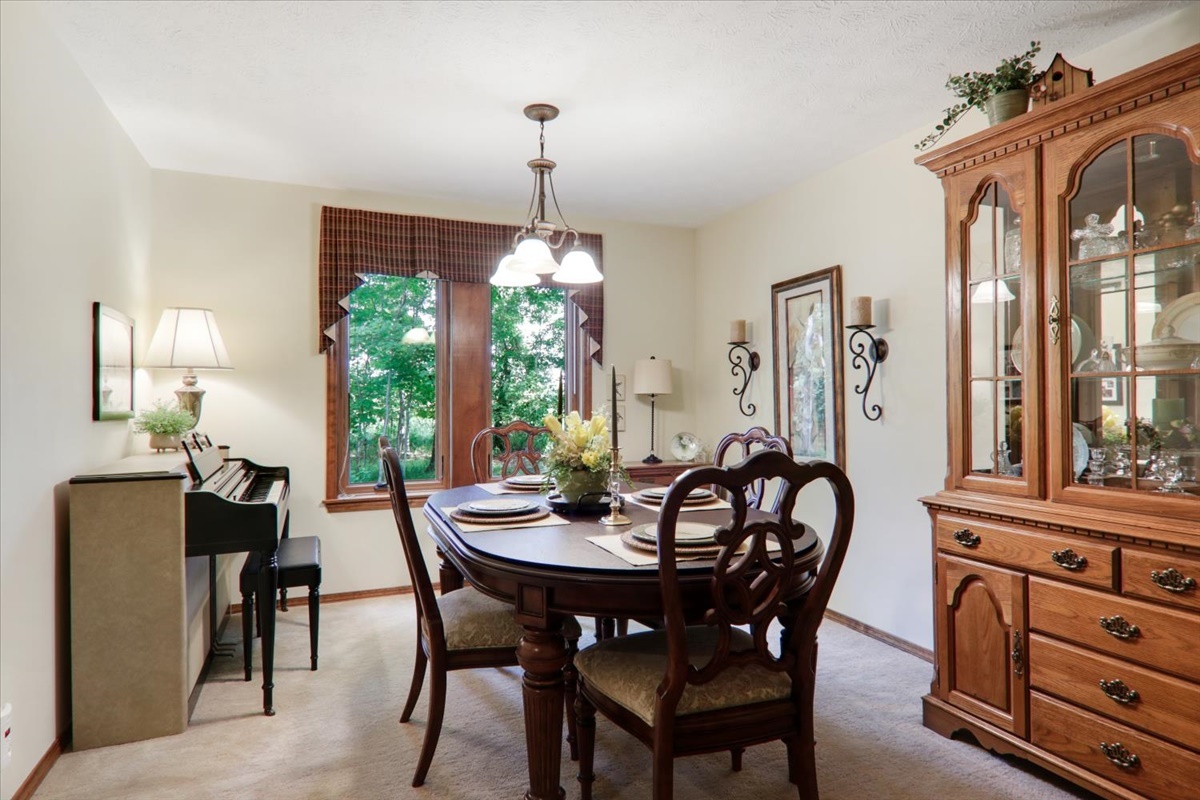 21 Bent Tree Lane Towanda, IL 61776 - Photo 17 of 49 a view of a dining room with furniture window and outside view