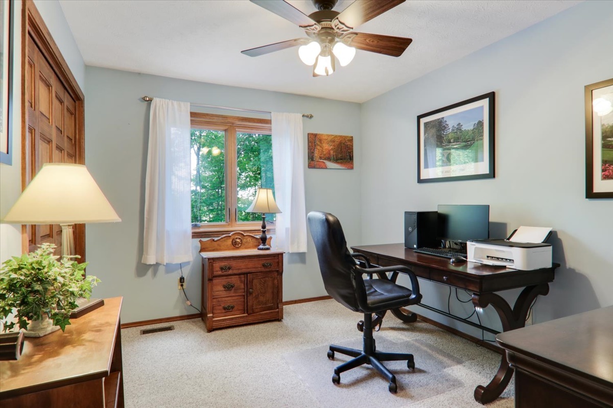 21 Bent Tree Lane Towanda, IL 61776 - Photo 23 of 49 a view of a workspace with furniture and a window