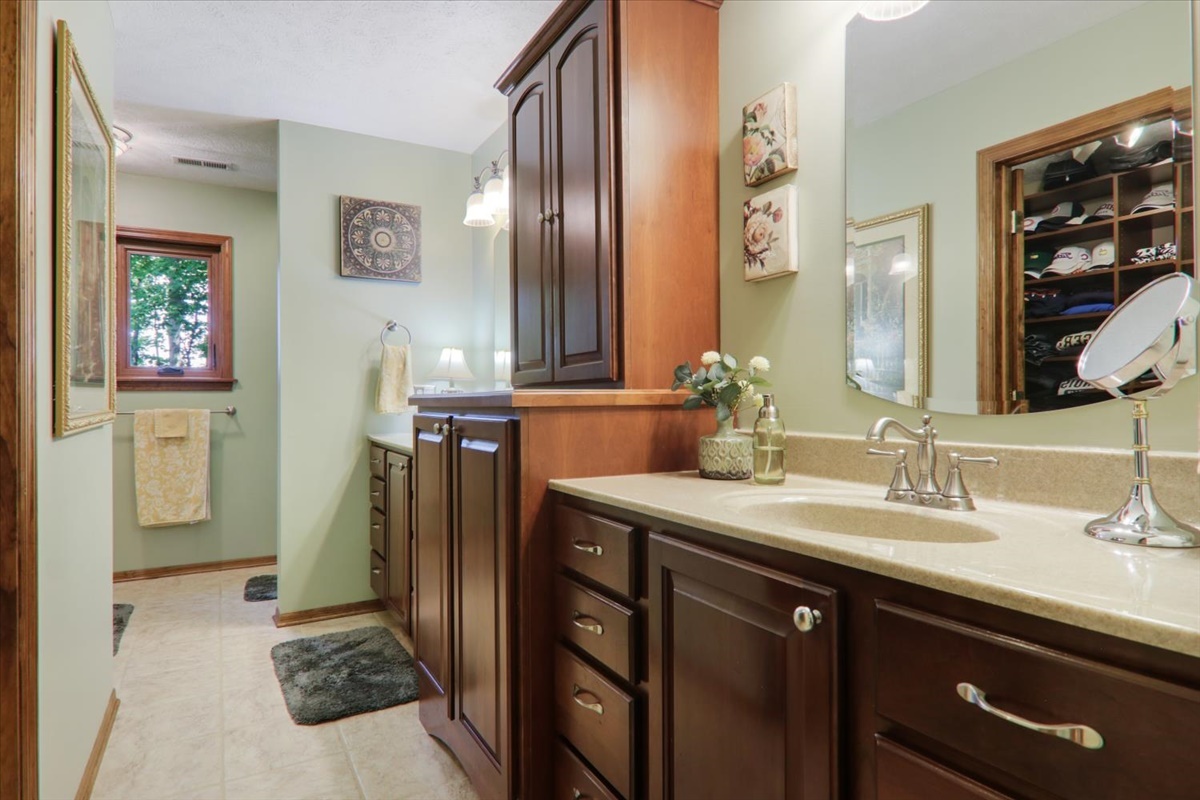 21 Bent Tree Lane Towanda, IL 61776 - Photo 27 of 49 a bathroom with a sink double vanity and a mirror