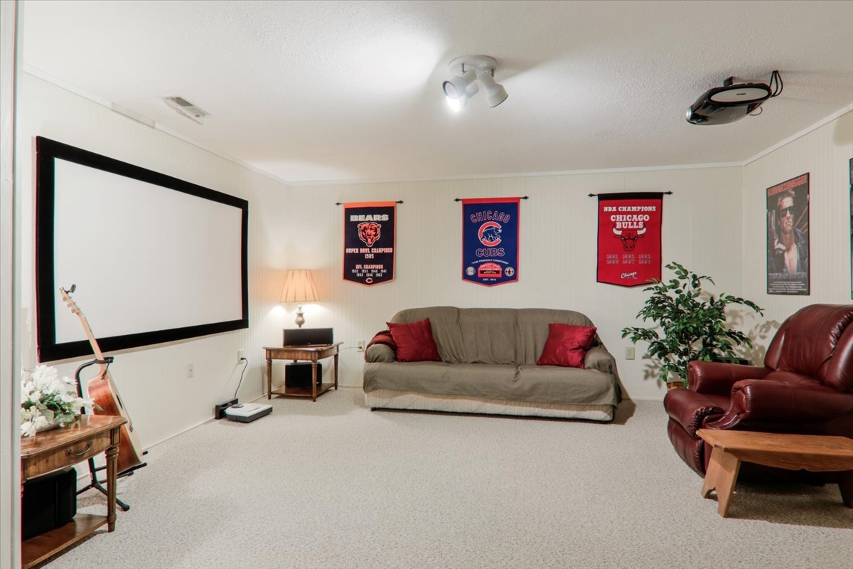 21 Bent Tree Lane Towanda, IL 61776 - Photo 33 of 49 a living room with furniture and a flat screen tv