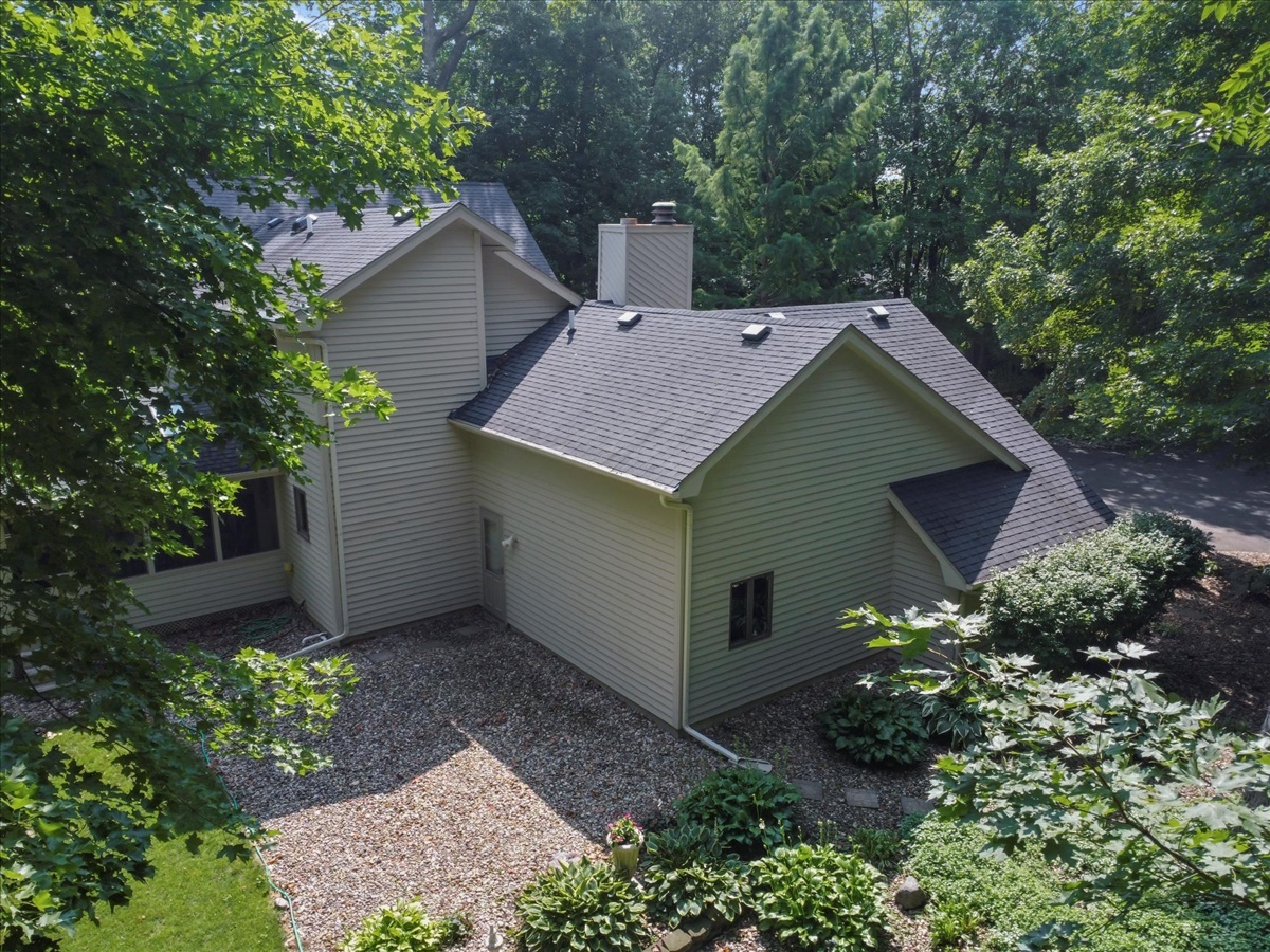 21 Bent Tree Lane Towanda, IL 61776 - Photo 38 of 49 a view of a house with a yard and plants