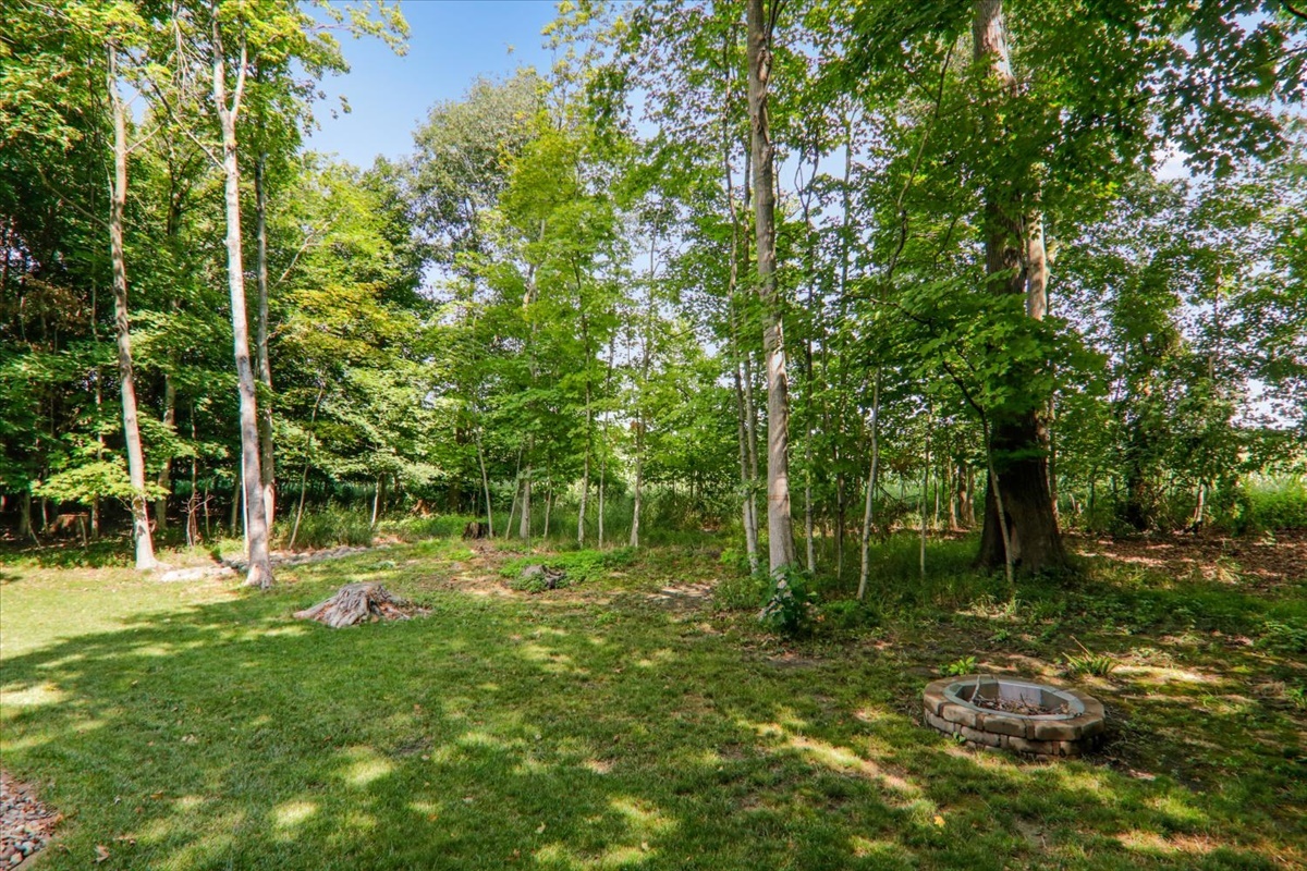 21 Bent Tree Lane Towanda, IL 61776 - Photo 40 of 49 a backyard of a house with lots of green space
