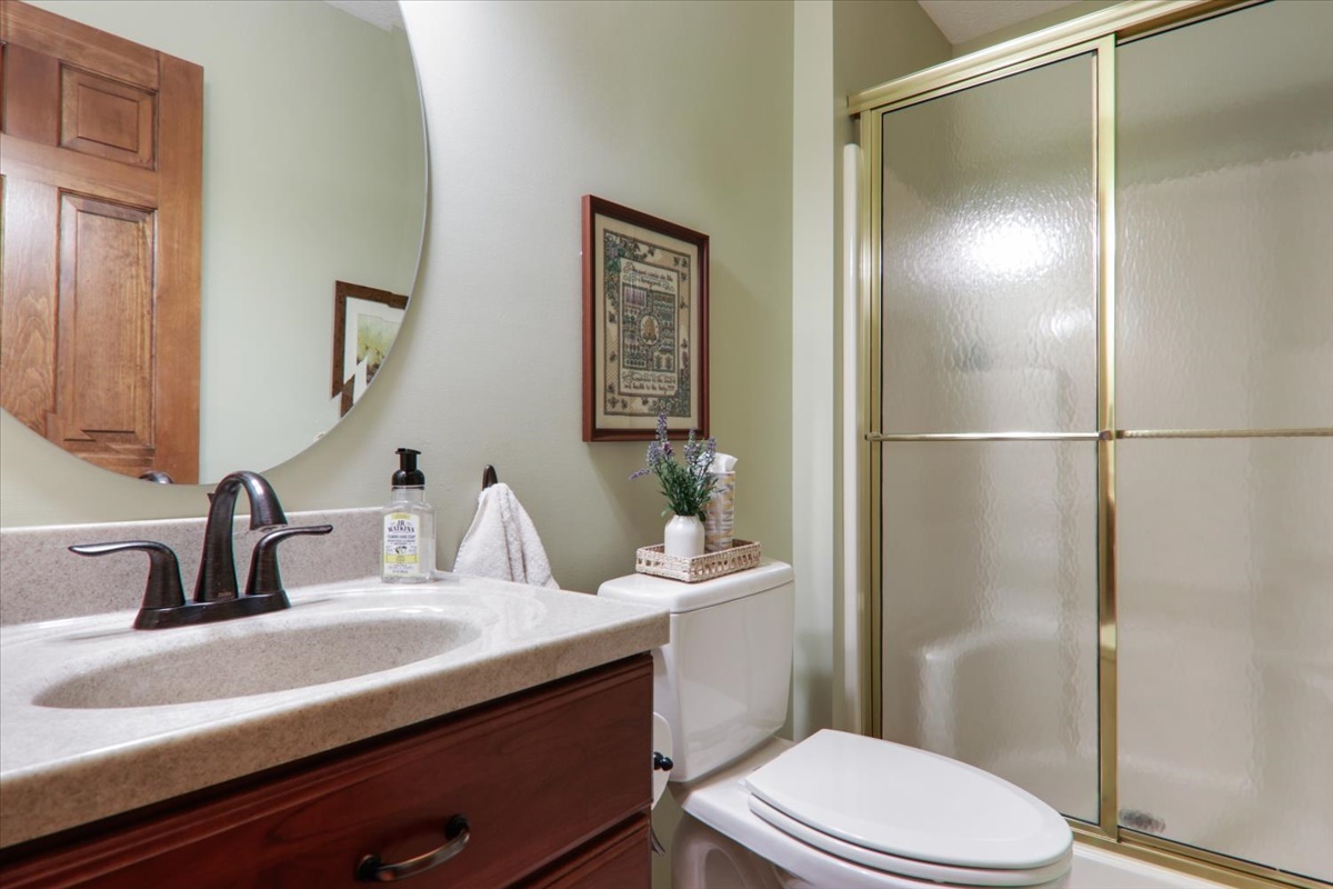 21 Bent Tree Lane Towanda, IL 61776 - Photo 10 of 49 a bathroom with a sink a toilet and shower