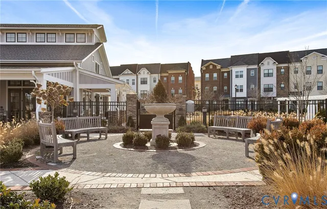 a view of a building with sitting area